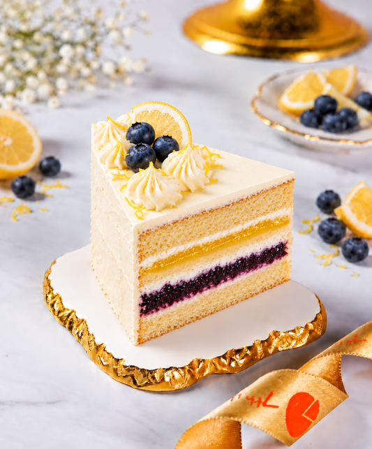 Lemon & Blueberry Drizzle Cake Slice